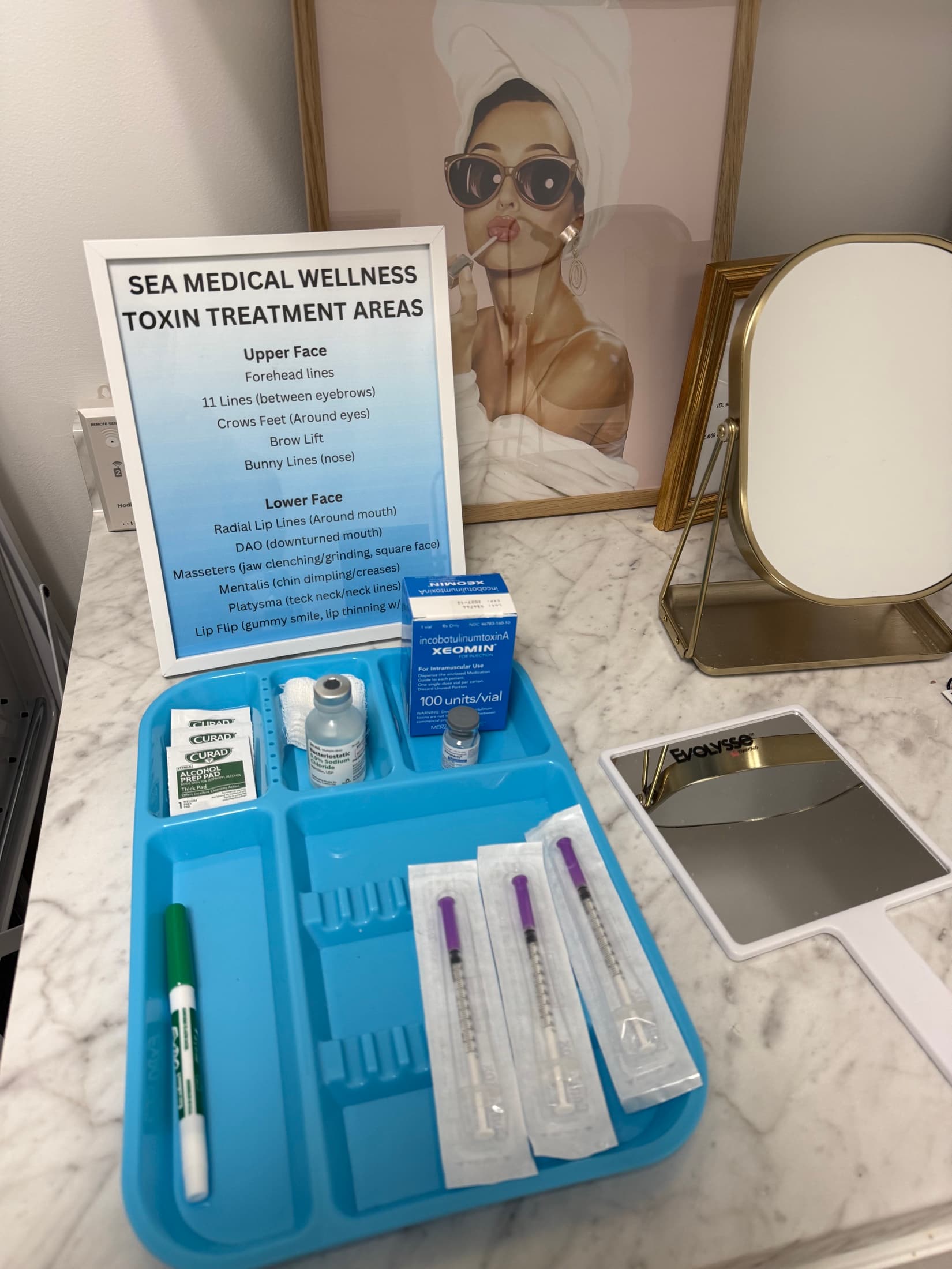 Prepared syringes and Xeomin vial for wrinkle relaxer treatment at SEA Medical Wellness