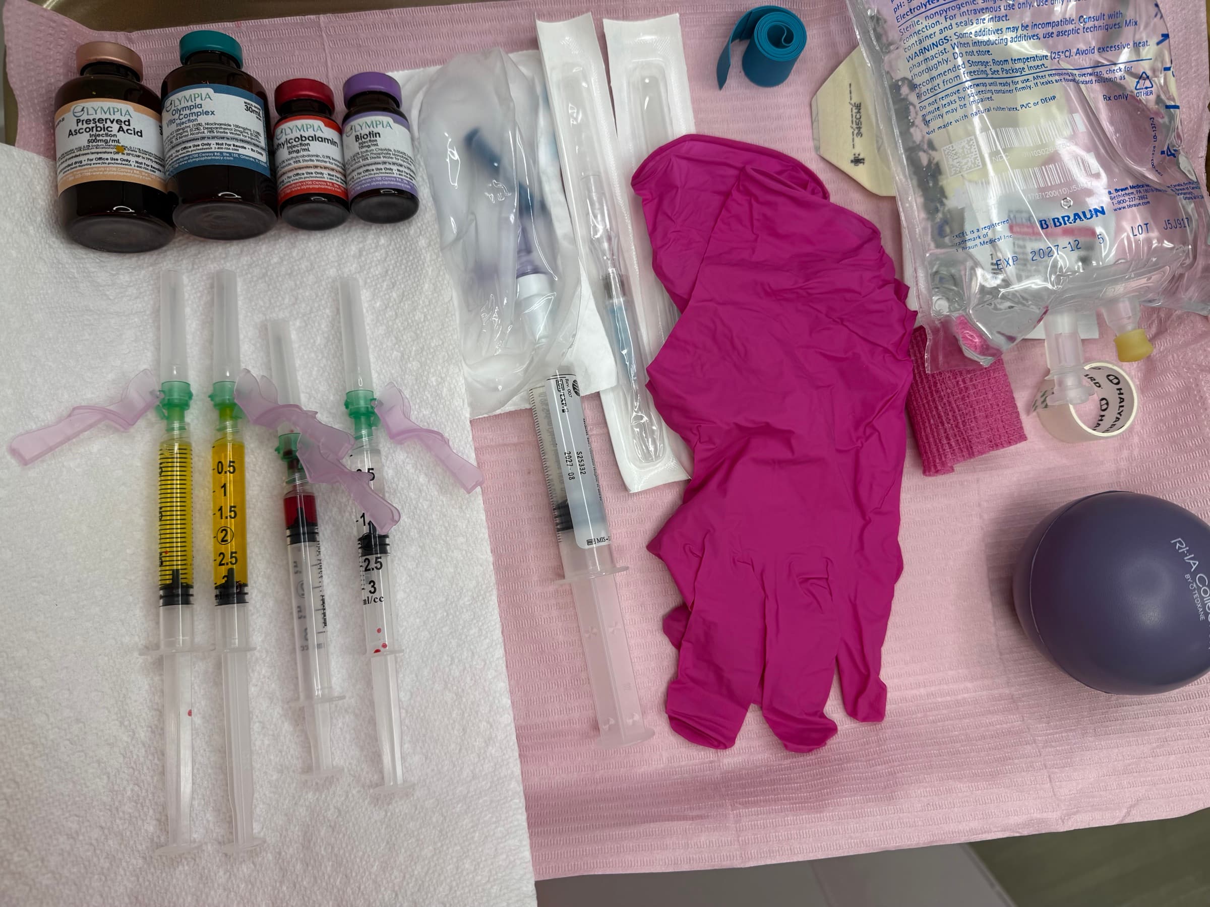 IV hydration and vitamin therapy supplies, including saline and vitamin vials